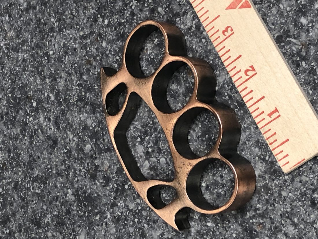Man charged with trying to take brass knuckles into court News